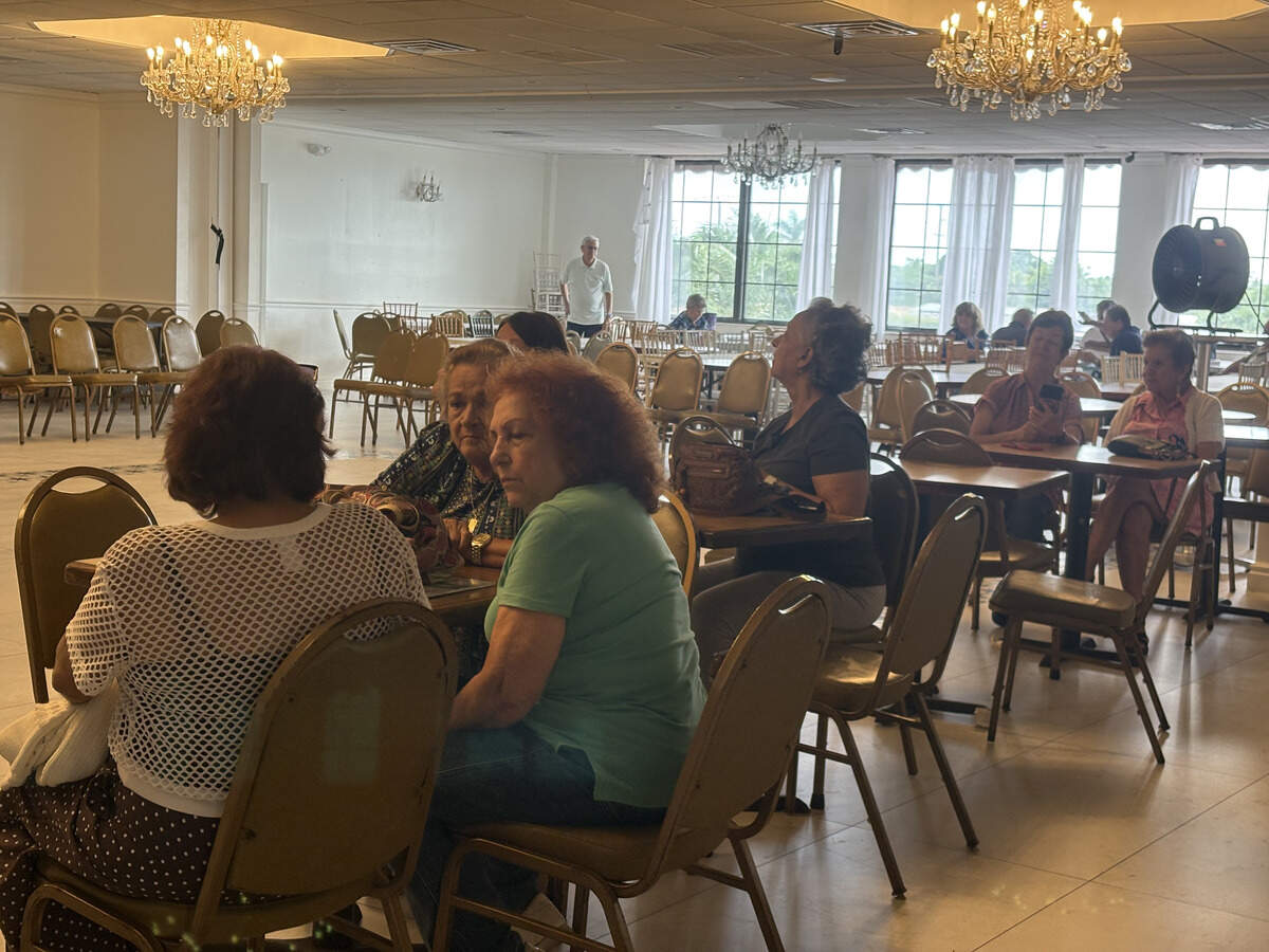 Seniors gather at Salon Tropical inside La Carreta, the new location where nonprofit Little Havana Activities & Nutrition Centers will provide meals and activities after the organization was forced to end its operations at Goodlet Park by Hialeah Mayor Bryan Calvo.